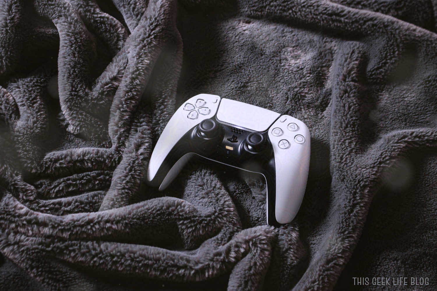 Cozy Controller on a Blanket, This Geek Life Blog