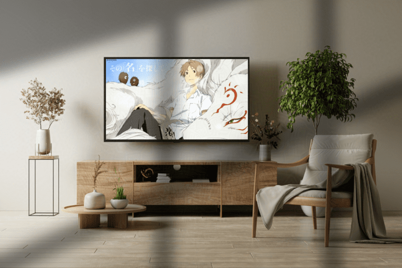 A cozy living room television with Natsume's Book of Friends playing on This Geek Life Blog.